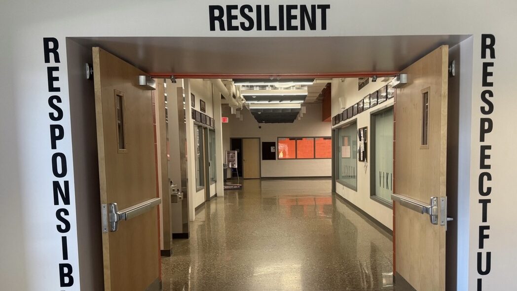 Hallway with words "Responsible" "Resilient" and "Respectful" painted on walls