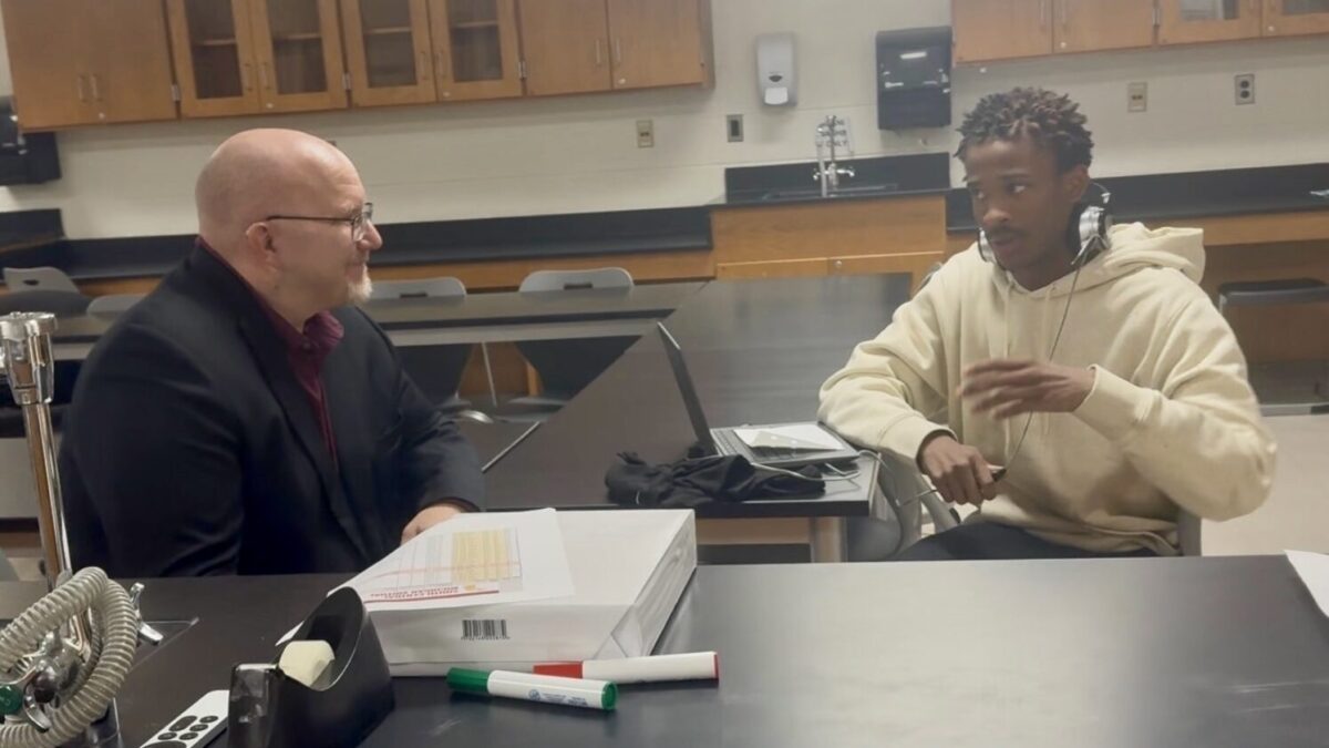 Colin talking with a Jackson Pathways student